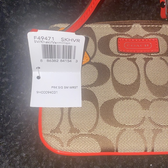 NWT coach park signature wristlet. Khaki/ bright vermillion red - Picture 4 of 6